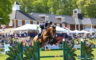 Andrew Ramsay and Cocq a Doodle claimed the $130,000 Empire State Grand Prix CSI3*, presented by the Kincade Group, as the featured event of the Old Salem Farm Spring Horse Shows in 2017. Photo by Jump Media