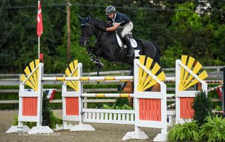 Ireland’s Kevin Mealiff won the $10,000 Voltaire Designs Mini Prix riding Dante at the Old Salem Farm Fall Classic. Photo by SEL Photography